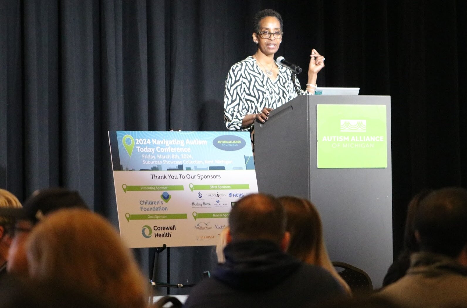 Dr. Tisa Johnson-Hooper spoke at the 2024 NAT conference about the many barriers autistic people face. AAoM helps autistic people, their families, loved ones, and providers overcome those barriers.