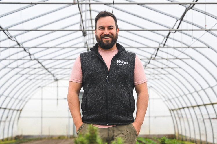 Farmer Will Jaquinde works at The Farm at Trinity Health Ann Arbor (THAA).