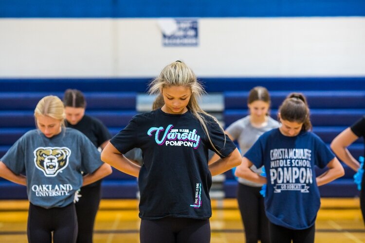 Makayla Olson, in the Varsity PomPon shirt, at a recent team practice.