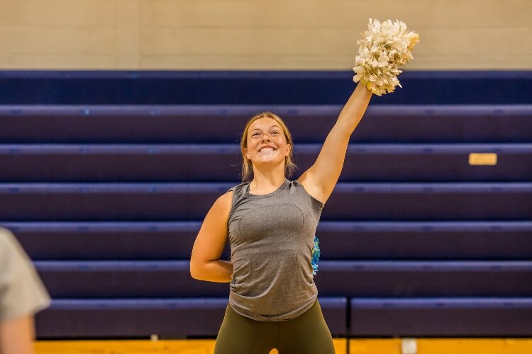 Jessica Foss rehearses with the award-winning John Glenn Pompon team