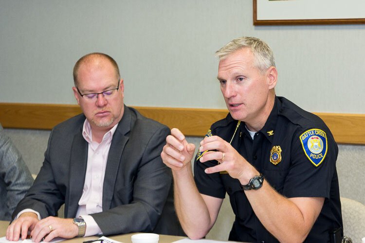 United Way of the Battle Creek and Kalamazoo Region president and CEO Chris Sargent and Battle Creek Police Department chief Jim Blocker at a Bearcat Meeting.