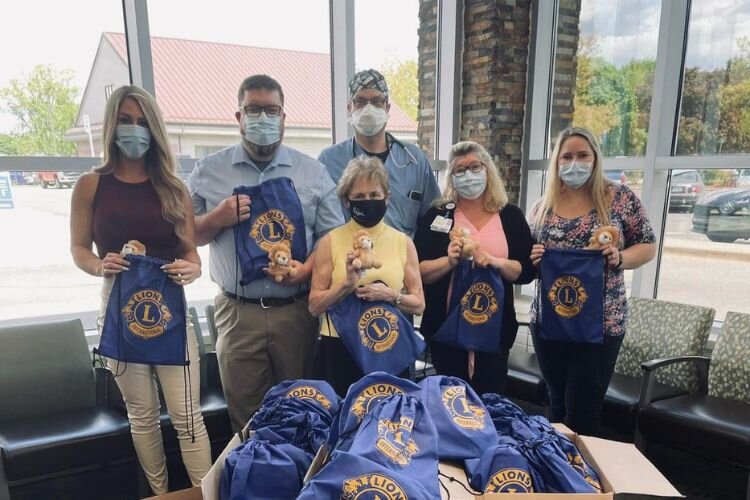The Lions Club has donated over 190 string backpacks for children visiting McLaren Central Michigan.