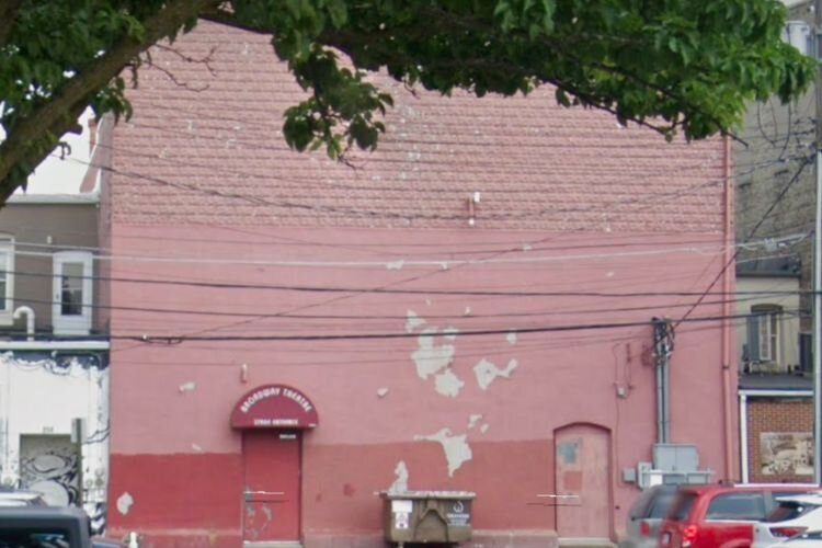 A grant was awarded to update the exterior walls of the Broadway Theatre. This photo is “before” the update.