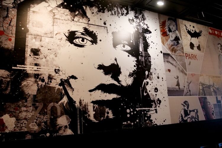 Adorning the walls of the new Twisted Fork restaurant is artwork that reflects Grondin’s style—it’s part artwork of others and part of his own designs.