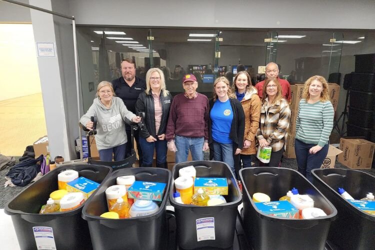Group of Rotarians volunteering at Christmas Outreach in December 2023.