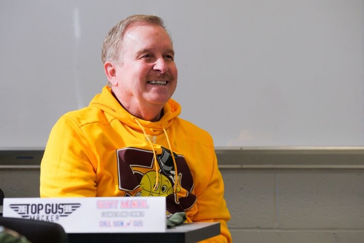 Scott McNeal, president and managing partner of Macker Basketball, discusses event logistics with Central Michigan University recreation students in Mt. Pleasant, MI on Thursday, April 25, 2024. 
