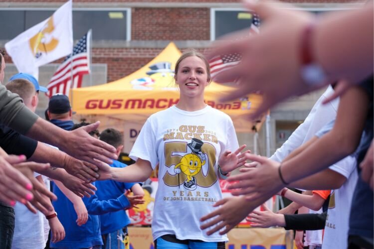 Players are introduced as they take the court to play 3-on-3 basketball in the Gus Macker tournament in Mt. Pleasant, MI on Saturday, April 27, 2024.