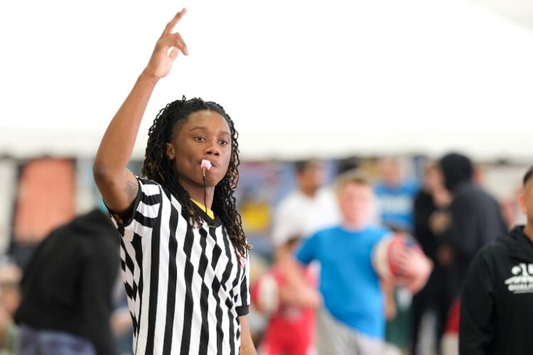 A referee watches game action inside Finch Fieldhouse during the Gus Macker 3-on-3 basketball tournament in Mt. Pleasant, MI on Saturday, April 27, 2024.
