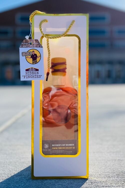 Similar to Disney’s “Hidden Mickeys,” on the bourbon and vodka bottles’ hang tags, “Hidden Finchies” share historical connections. “For example, one of the parts of the label, it says from 1892 to 1982 to today, Finch Forever. 1892 was the founding year of CMU and 1982 was our first accreditation,” explains Otteman. Photo Credit: Tim Otteman