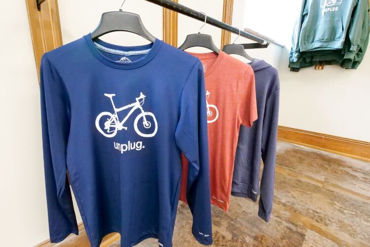 Some of Life Unplugged’s best sellers include tee shirts, long-sleeved shirts, and hoodies. Photo Credit: Courtney Jerome / Epicenter Mt. Pleasant