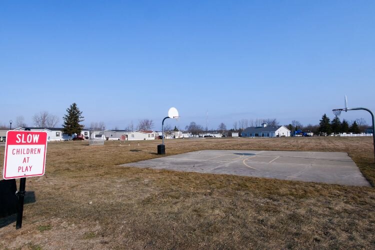 A basketball court, baseball diamond, and playground are some amenities offered in Summerhill’s resident park, centrally located on the 100-acre property. Photo Credit: Courtney Jerome / Epicenter Mt. Pleasant