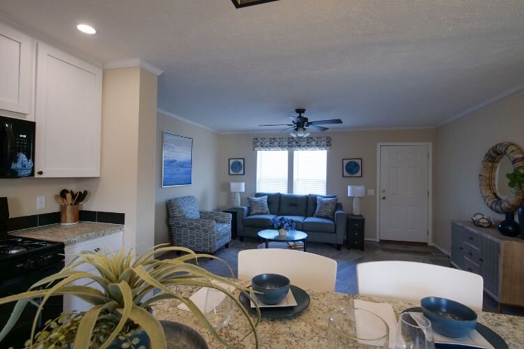 This 4 bedroom, 2 bath model coming soon to Summerhill Village will be listed for about $103,000 with views of the Clubhouse and community park. Photo Credit: Courtney Jerome / Epicenter Mt. Pleasant