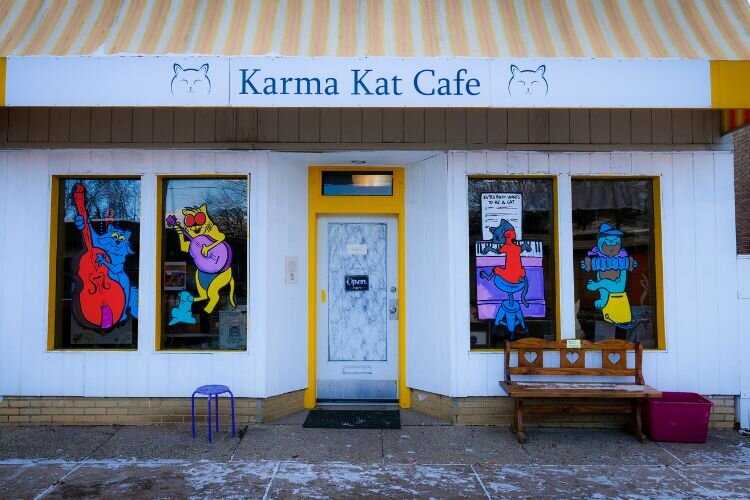 Corby Blem appropriately painted holiday “Aristocats” at Karma Cat Cafe on Broadway Street. Photo Credit: Courtney Jerome / Epicenter Mt. Pleasant