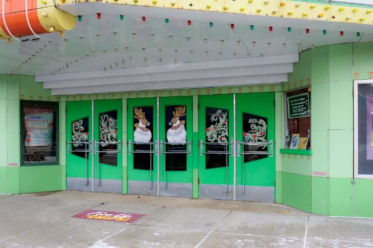 Broadway Theater displays holiday window artwork by artist Sara Woodruff. Photo Credit: Courtney Jerome / Epicenter Mt. Pleasant