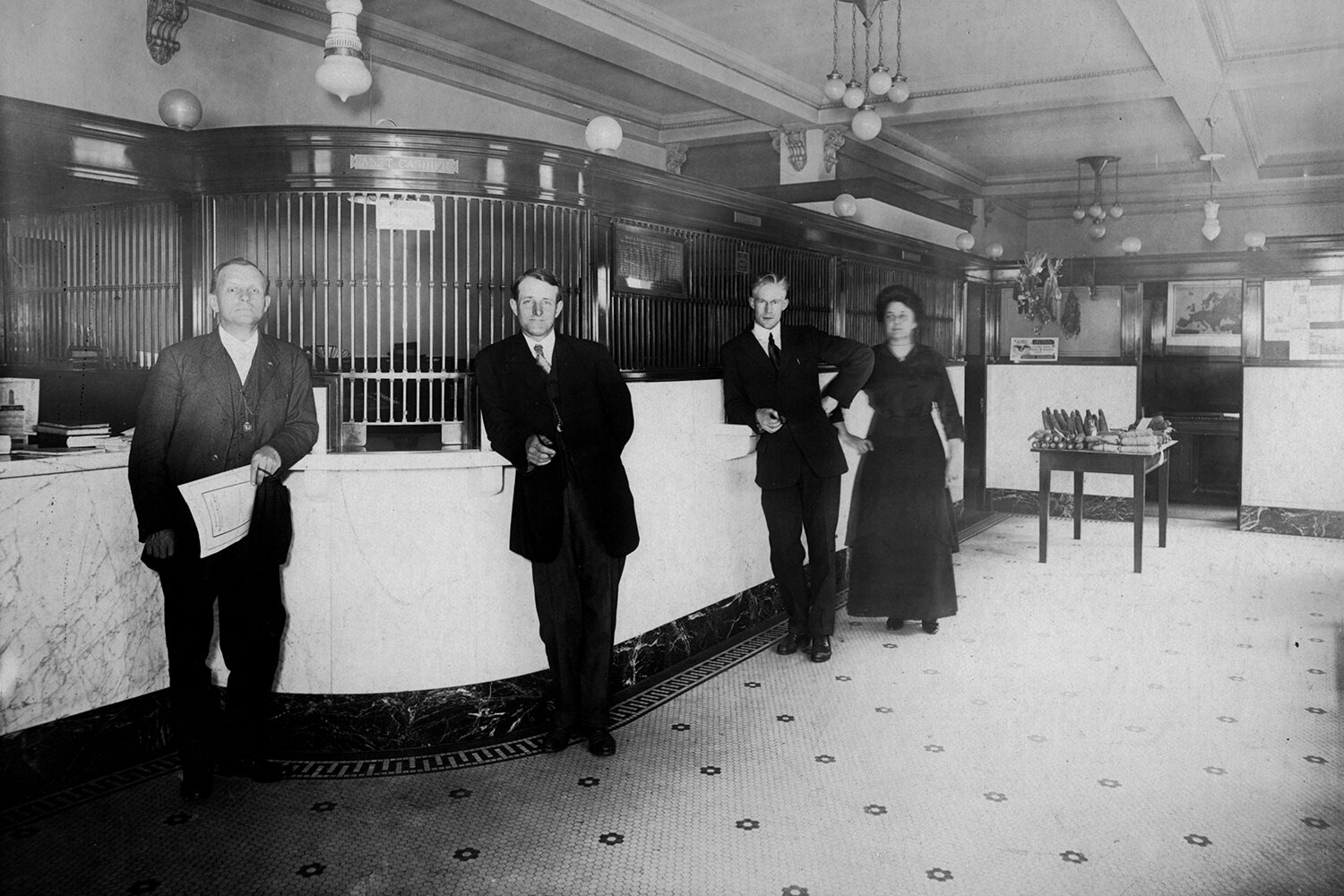 A historical image of Isabella Bank’s original branch employees in the 1900s, located at E. Broadway in Downtown Mt. Pleasant. (Photo courtesy of Isabella Bank)
