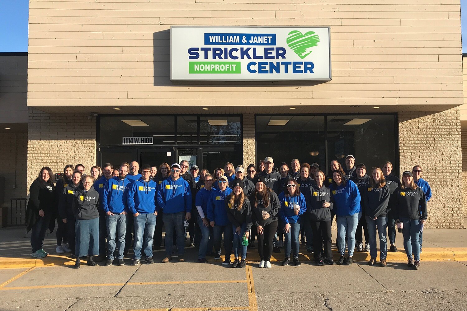 Isabella Bank team members volunteer at Mt. Pleasant’s Strickler Center during the Compassion into Action event in 2022. (Photo courtesy of Isabella Bank)