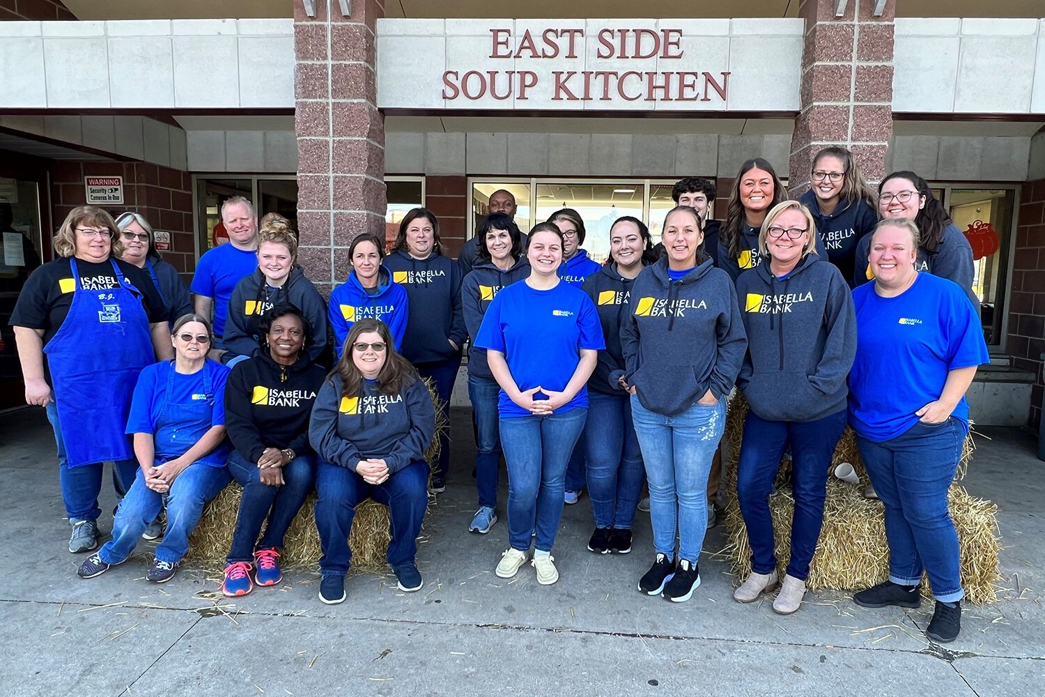 Isabella Bank team members volunteer at Saginaw’s East Side Soup Kitchen during the Compassion into Action event in 2022. (Photo courtesy of Isabella Bank)