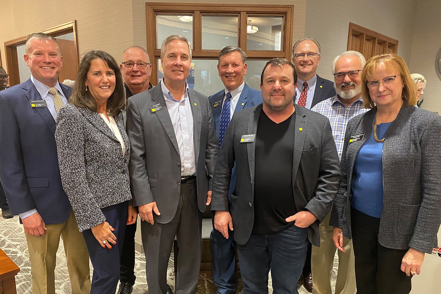 Isabella Bank’s Board of Directors celebrates the State Street Saginaw Branch opening during a ribbon cutting ceremony in May 2023. (Photo courtesy of Isabella Bank)