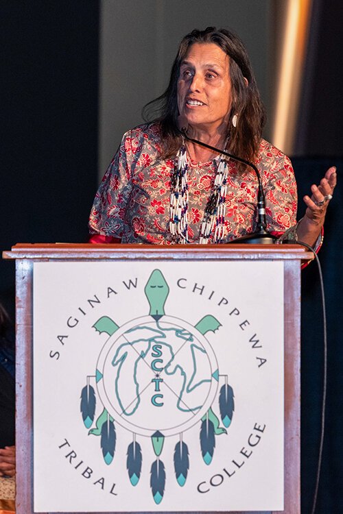 Winona LaDuke speaks to students, faculty, and families during the SCTC graduation ceremony. (Photo courtesy of Miss Lily Photography)