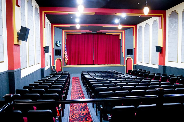 Lisa Benic and her sisters restored many of the iconic elements of the theater, like the skyscraper pendant light fixtures, hardwood stage flooring, and acoustic panels. (Photo: Courtney Jerome/Epicenter)