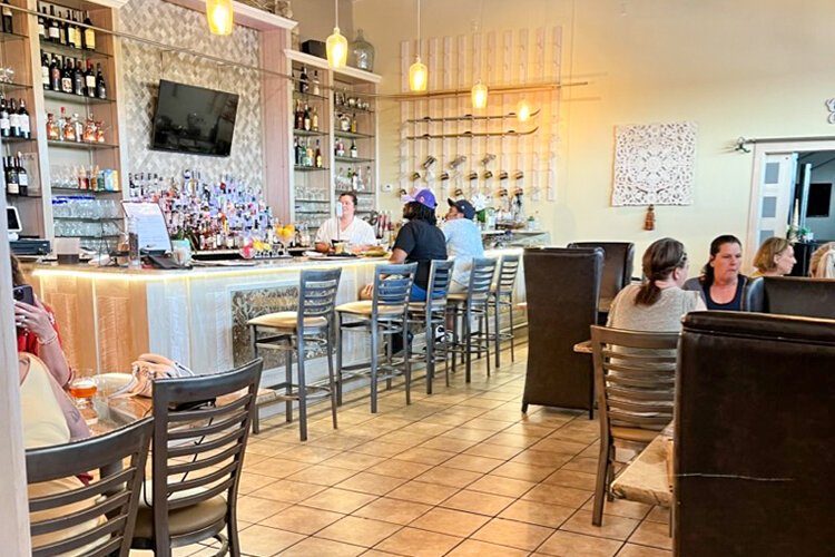 Guests enjoy Bill and Cindy Walz's culinary delights at STIR Craft Cocktails & Modern Kitchen. (Photo courtesy of Preston J. Slominski)