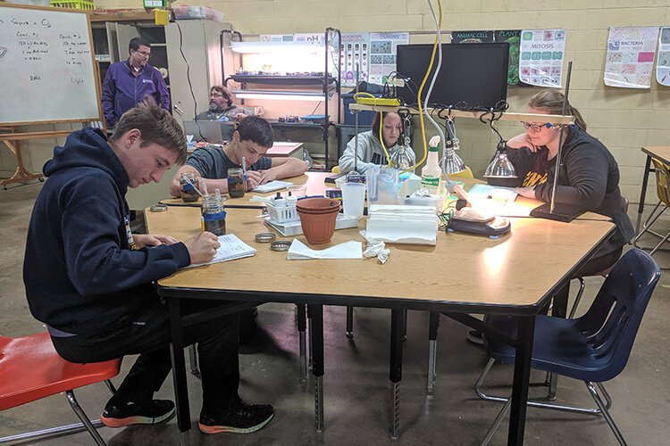Students take notes during an in-class biology lab and lecture at Mid Michigan College. (Photo courtesy of Mid Michigan College)