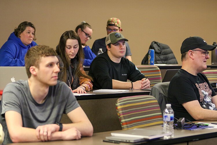 A group of students takes notes during a lecture at Mid Michigan College. (Photo courtesy of Mid Michigan College)