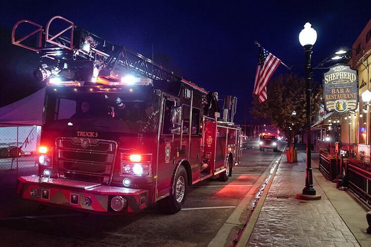 Truck 3 of the Saginaw Chippewa Indian Tribe Tribal Fire Department heads east on Wright Avenue during the Maple Syrup Festival Emergency Vehicle Parade in Shepherd, MI on Friday, April 28, 2023. (Photo: Dan Gaken/Epicenter)