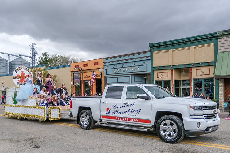 The Maple Syrup Princess Pageant float travels down Wright Avenue at the Maple Syrup Festival Parade in Shepherd, MI on Sunday, April 30, 2023. (Photo: Dan Gaken/Epicenter)