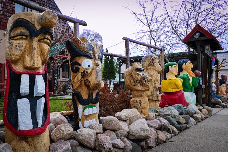 Wooden statues carved by Jib-Bob Korean Restaurant owner Maya Denslow. (Photo: Courtney Jerome/Epicenter)