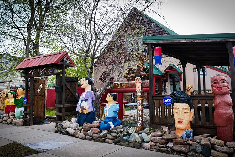 Wooden statues carved by Jib-Bob Korean Restaurant owner Maya Denslow. (Photo: Courtney Jerome/Epicenter)