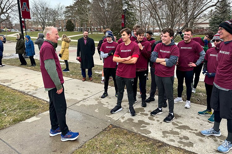 Sandy Hulme partakes in a celebration at Alma College for his 50-year running streak. (Photo courtesy of Alma College)