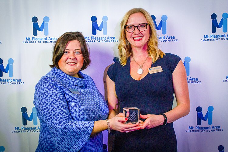 2022 Rising Star Community Impact Award winner Sarah Christensen poses for a picture with Amanda Schafer during the 66th Annual Awards Banquet on March 4, 2023. (Photo courtesy of Mt. Pleasant Area Chamber of Commerce)