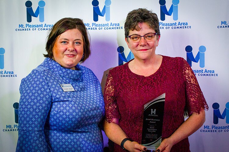 Amy Perschbacher, the owner of Ronan Psychological Associates, accepts the 2022 Small Business Award during the 66th Annual Awards Banquet on March 4, 2023. (Photo courtesy of Mt. Pleasant Area Chamber of Commerce)