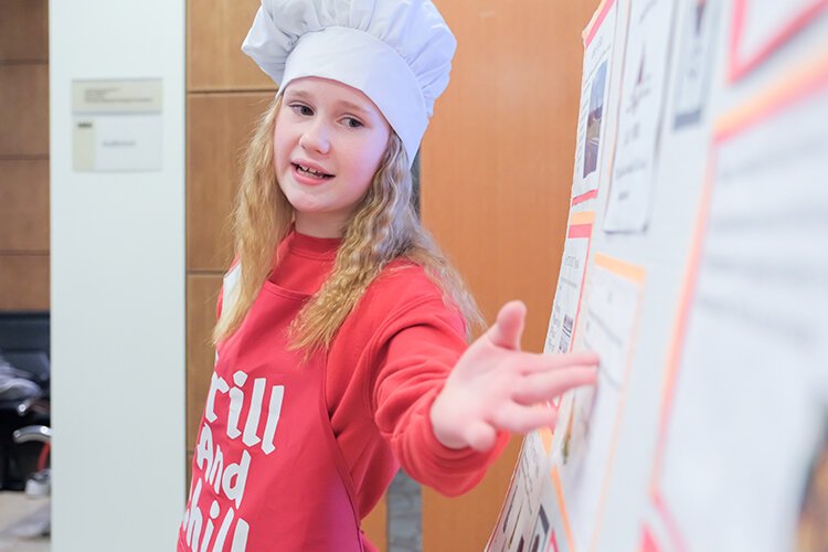Sacred Heart Academy 6th grade student Lillian Dubridge shares the Bar-B-Cuties team idea to install a grill at the Isabella County Commission on Aging. (Photo: Dan Gaken/Epicenter)