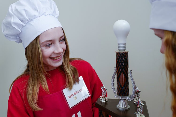 Dubridge and Wohlscheid received the PITCH-ER THIS! traveling trophy, which will be displayed at Sacred Heart Academy until the 2024 competition. (Photo: Dan Gaken/Epicenter)