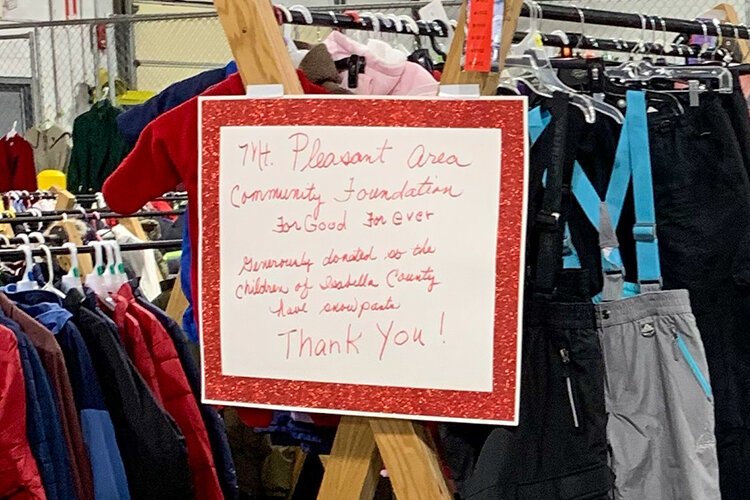 The Mt. Pleasant Area Community Foundation provides snow pants to children in Isabella County. (Photo courtesy of MPACF)