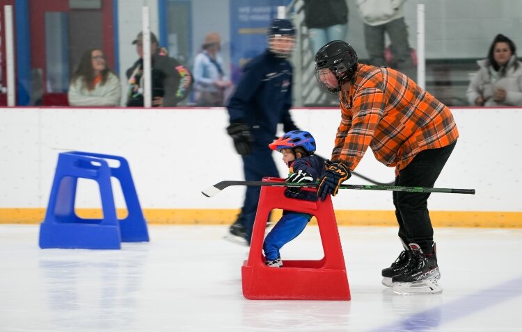 The Amateur Hockey Association of Mt. Pleasant provides equipment and free hockey nights to encourage kids to try out the sport. (Photo Courtesy of Addy Wachter)