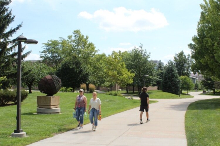 Walkers enjoy the last quiet days of summer walking around and touring campus on Sat., Aug. 27 before Fall classes began Mon., Aug. 29.  