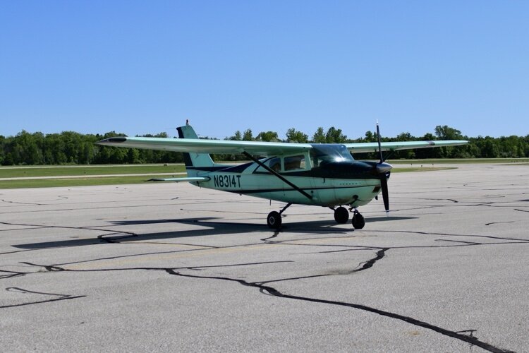 EAA Chapter 907 member and host of the event, Bill Cain, owns and operates Airplane N8314T, teaching children about his passion for aviation.
