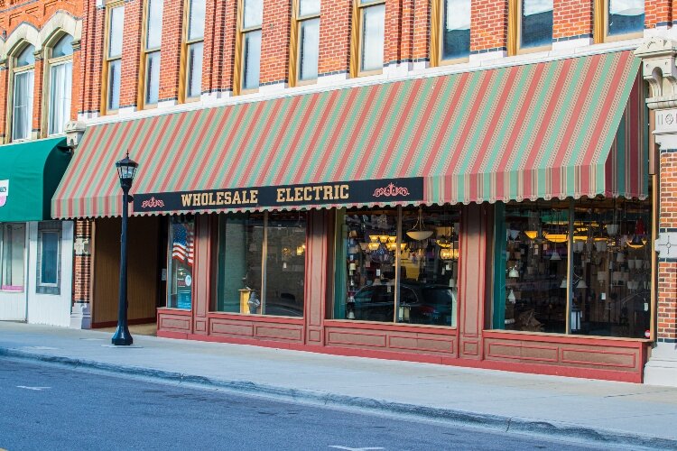 Spencer Fisher is considered to be the father of Greater Bay City. The building that bears his name is still in use today.