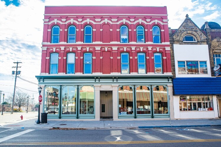 The Sage Block was constructed in 1873 and sits on the corner of Midland and North Walnut streets. Today, the building is home to MacMillan Associates Inc.