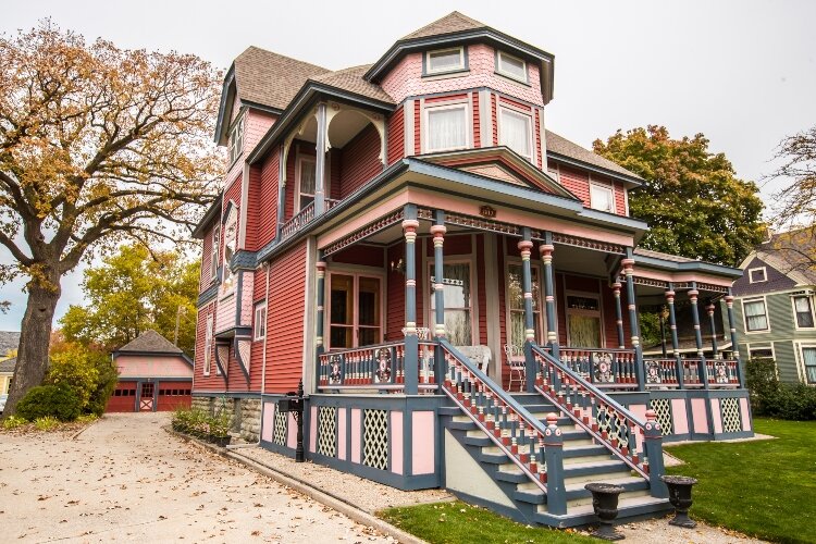 This colorful 2 Â½-store Queen Anne Home was built in 1875. Through the years, it’s been renovated several times. The most recent renovation in the mid-2000s removed aluminum siding, re-constructed the porch, and restored architectural details.