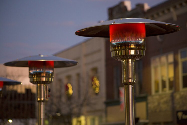 Some businesses are utilizing heat lamps in their outdoor spaces to extend outdoor dining options.