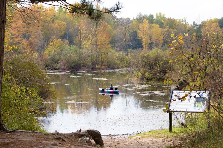A kayaker begins takes in the sights at Deerfield Nature Park.

"Deerfield Park is really great for hiking, biking, canoeing or kayaking," says Chris Rowley, Executive Director at the Mt. Pleasant Area Convention & Visitors Bureau (CVB). "A lot of people either launch or get out at Deerfield Parks."