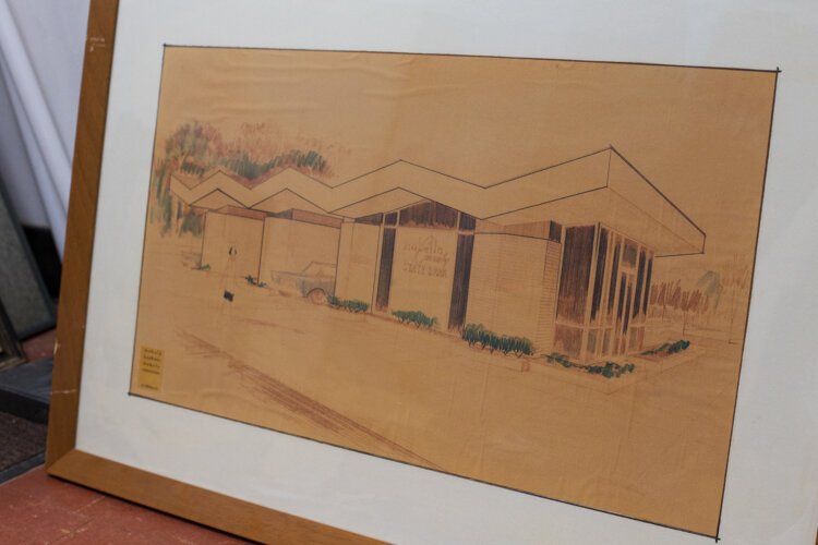 Concept art for an Isabella Bank location leans against the wall in a first floor storage room at 200 E. Broadway in Mt. Pleasant, Michigan.