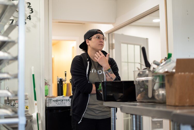 Benitez in front of the roasting room.