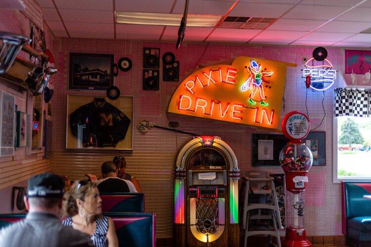 Names line the walls of Pixie Restaurant. Assistant Manager Nathan Black says the names come from patrons who have successfully completed the diner’s Bitty or Coney Challenge. “If you eat eight bitties or ten conies in an hour, you can get your name somewhere on our wall, ceiling, or under tables."