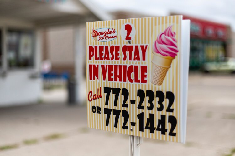 Ordering at Doozie’s has taken to over-the-phone ordering since COVID-19 hit Mt. Pleasant. Employees walk up to car windows to collect payment and deliver product, all the while masked and gloved.