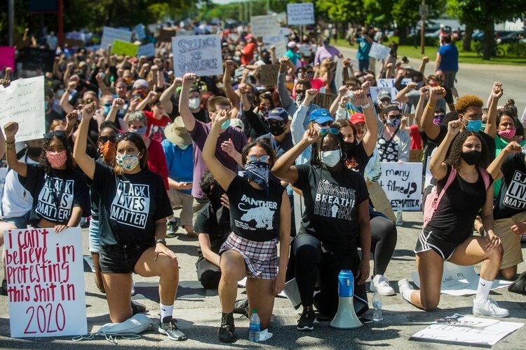 Camryn McGee, pictured immediate left of center at the Black Lives Matter rally.